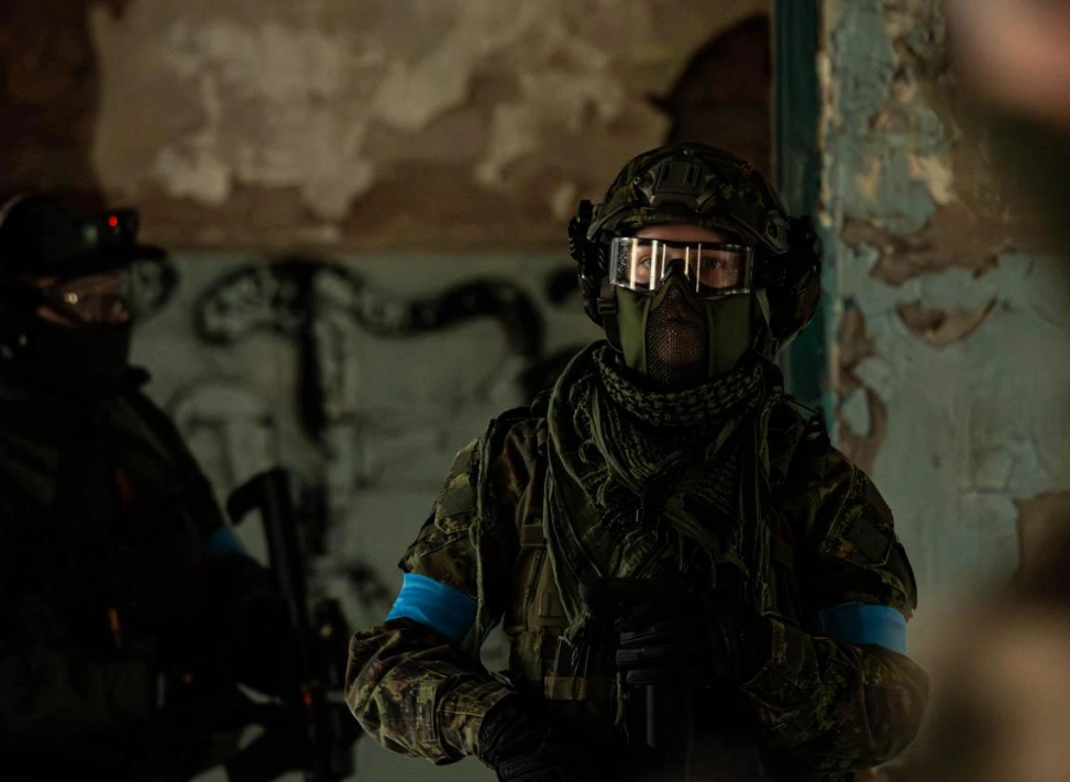 Group playing airsoft outdoors